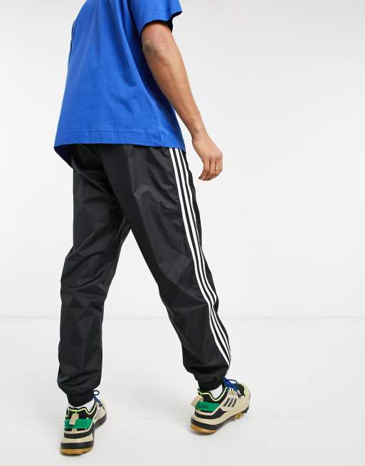 adidas Originals 3D trefoil track pants in black ASOS