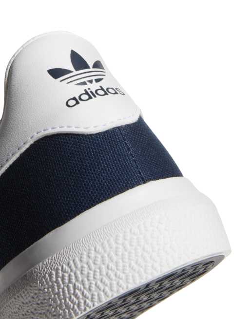 Adidas bleu 2024 et blanc