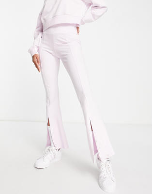 adidas Originals '80s Aerobic' split front flared pants in pink - ASOS Price Checker