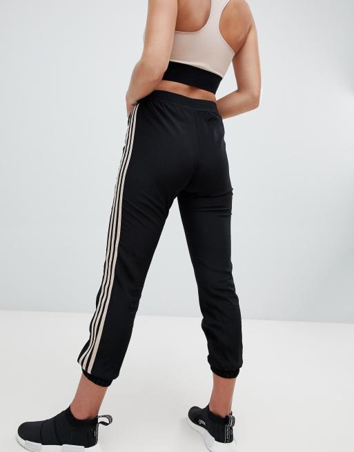 Adidas originals cuffed joggers 2025 in black and beige