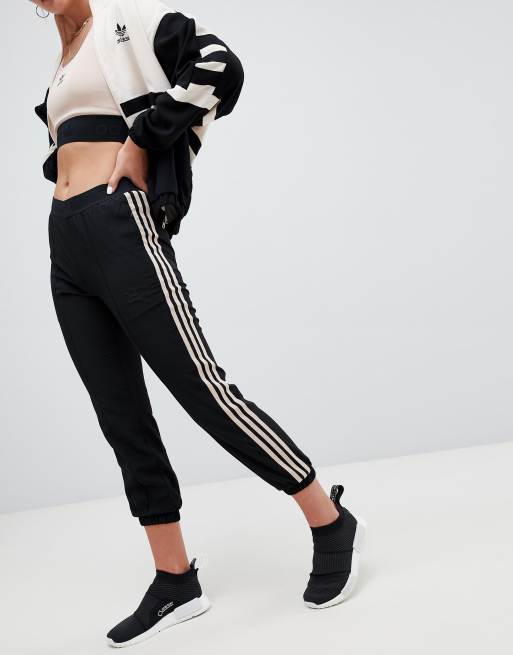 Adidas originals cuffed joggers 2025 in black and beige