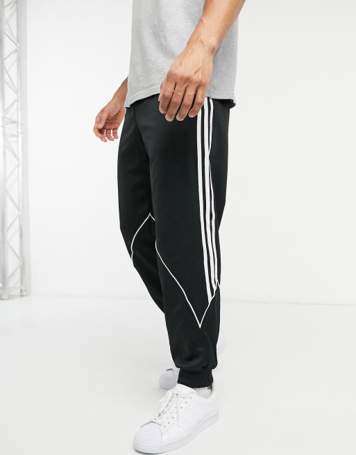 adidas Originals abstract trefoil track joggers in black