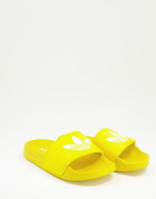adidas Originals Adelette Lite sliders in yellow