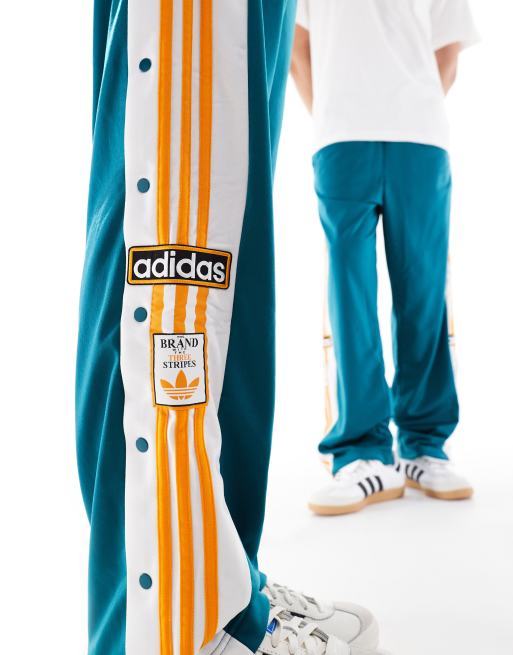 adidas Originals Adibreak Pantalon de survetement avec detail orange Sarcelle