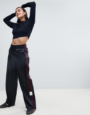 adidas originals three stripe popper pant with vintage logo in black