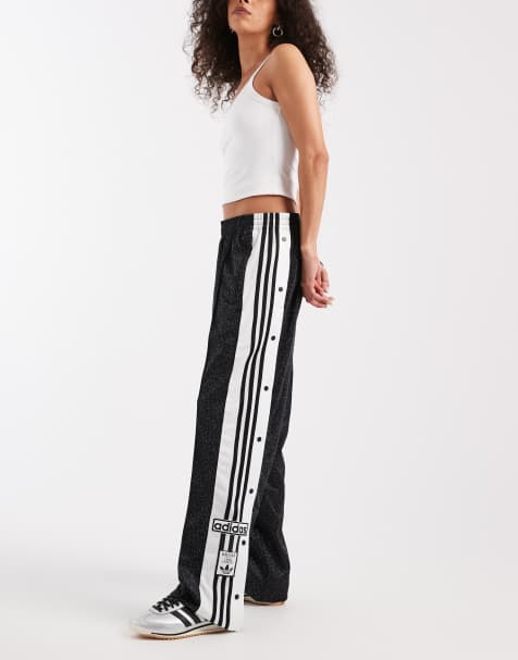 adidas Originals Adibreak track pants in black leopard print - view 1