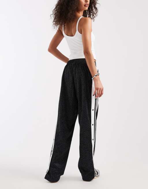 adidas Originals Adibreak track pants in black leopard print | ASOS