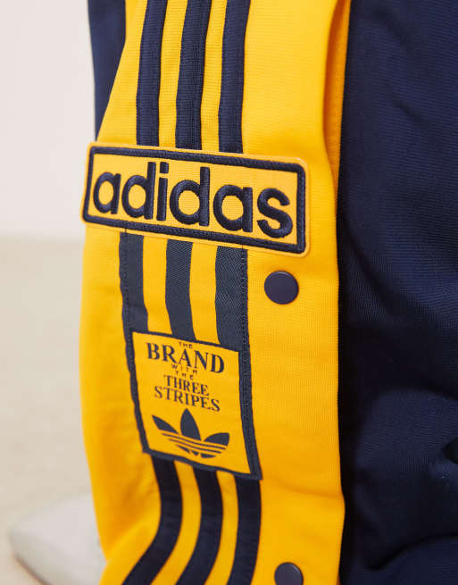 adidas Originals Adibreak track pants in navy and yellow 