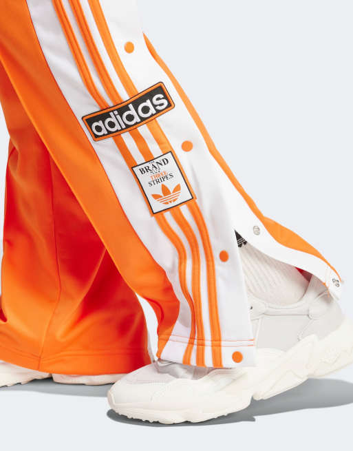 adidas Originals Adibreak track pants in orange ASOS