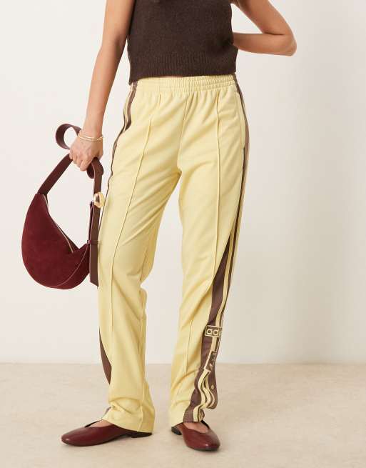 adidas Originals Adibreak track pants in yellow and brown