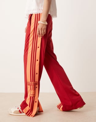 adidas Originals Adibreak Trainingsbroek in rood en oranje ASOS