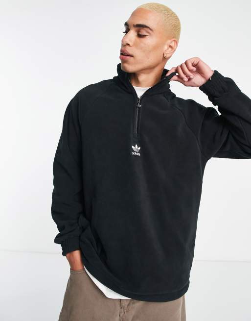 aplausos Costa Gama de adidas Originals adicolor 1/4 zip fleece in black with central logo | ASOS