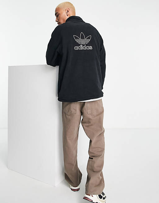 adidas Originals adicolor 1/4 zip fleece in black with central logo