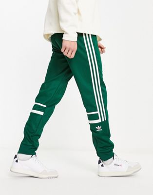 adidas Originals adicolor 3 stripe joggers in dark green