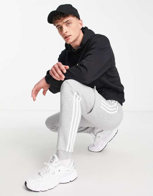 adidas Originals Adicolor 3 stripe slim trefoil cargo joggers in