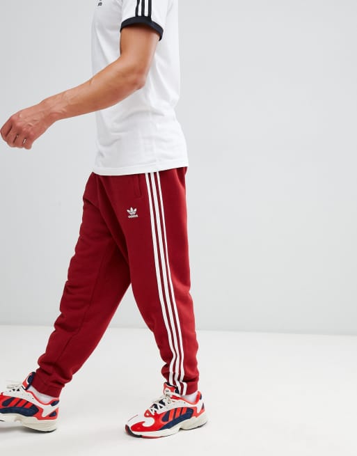 adidas Originals adicolor Three Stripe Track Pants In Red