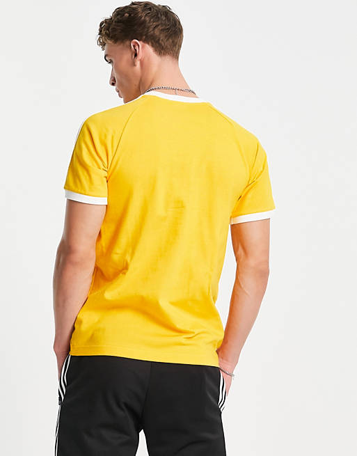adidas Originals adicolor 3-Stripes T-shirt in collegiate gold | ASOS