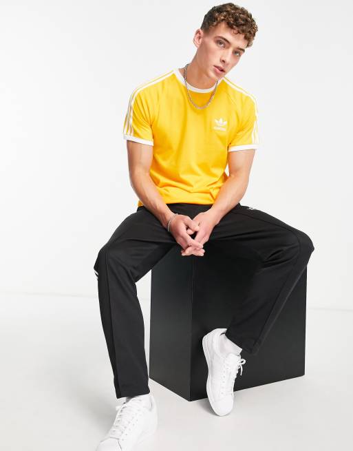 Adidas trefoil 3 stripes t shirt in gold best sale
