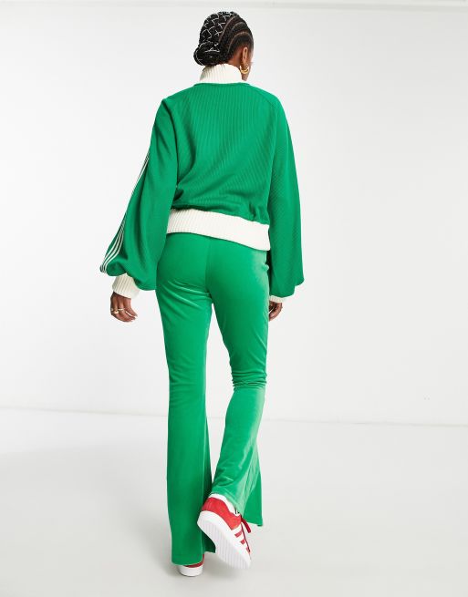 Adidas flared track pants green store