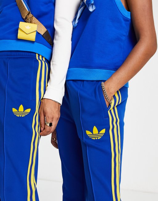 adidas Originals Womens Adicolor 70s Flared Iconic Track Pants in  Blue/Yellow 