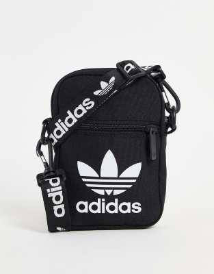 adidas Originals adicolor cross body bag with branded strap in black - ASOS Price Checker