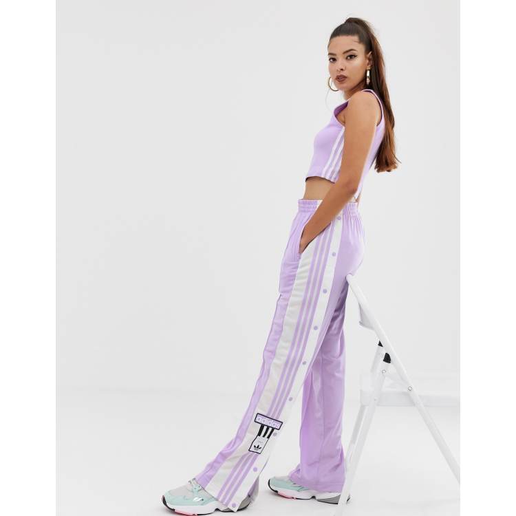 Pink adidas poppers discount