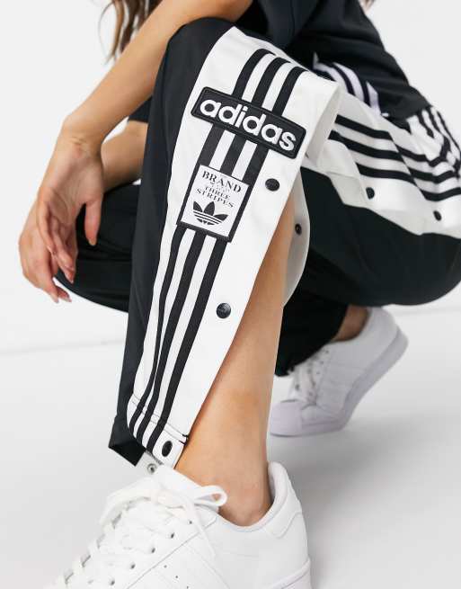 Adidas track pants 2025 logo on side