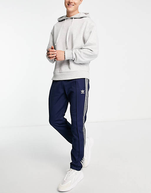 Drive out signature Unevenness adidas Originals adicolor Beckenbauer track pants in navy | ASOS