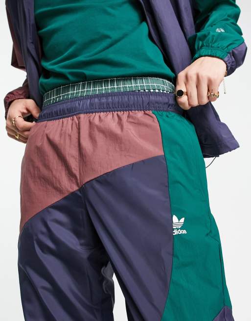 adidas Originals adicolor Bold mixing wovens track pants in navy