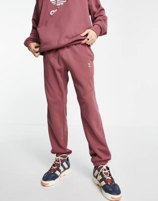 adidas Originals adicolor Bold mixing wovens track pants in quiet crimson