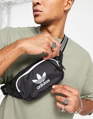 adidas Originals adicolor bum bag in black with striped strap