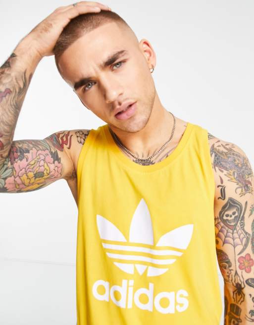 adidas Originals adicolor Canotta gialla con logo grande ASOS