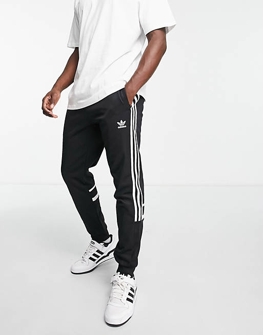 adidas Originals adicolor Challenger stripe slim fit sweatpants in black |