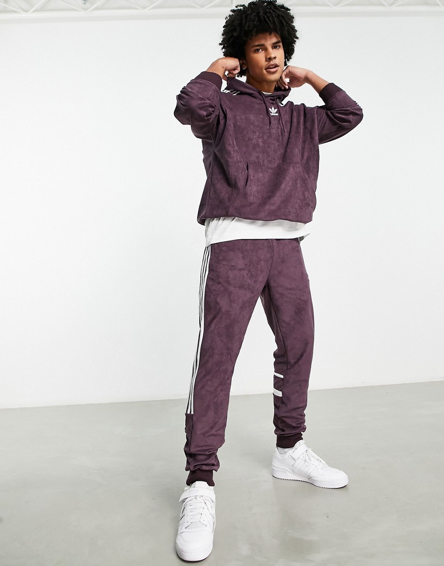 Adidas Originals adicolor Challenger three stripe sweatpants in purple
