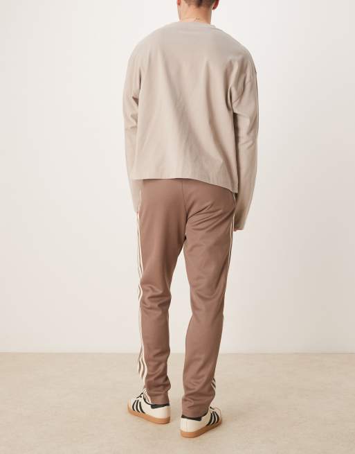 Adidas beckenbauer track pants beige discount