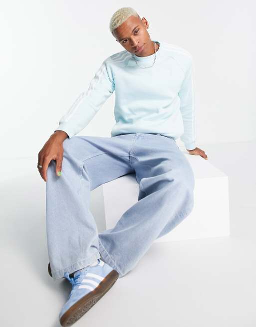 Felpa adidas azzurra cheap con strisce bianche