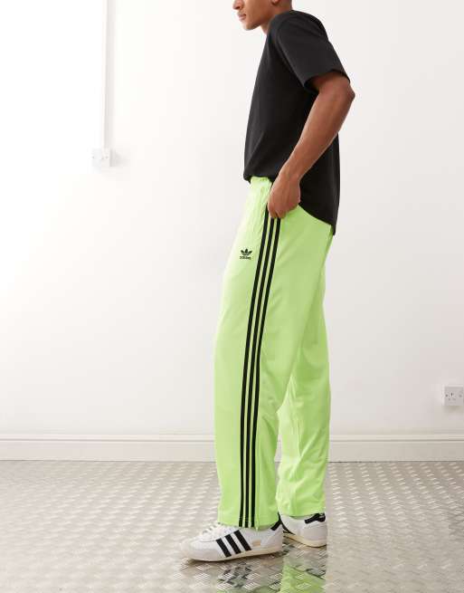 adidas Originals Adicolor classics firebird track pants in signal green / black