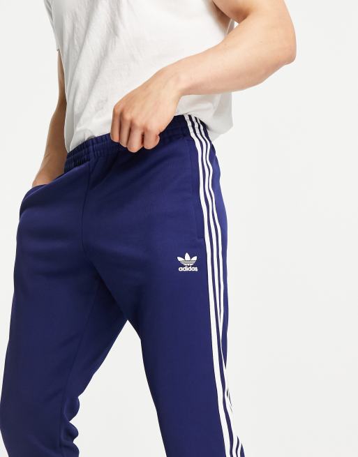 adidas Originals adicolor classics SST joggers in navy NAVY