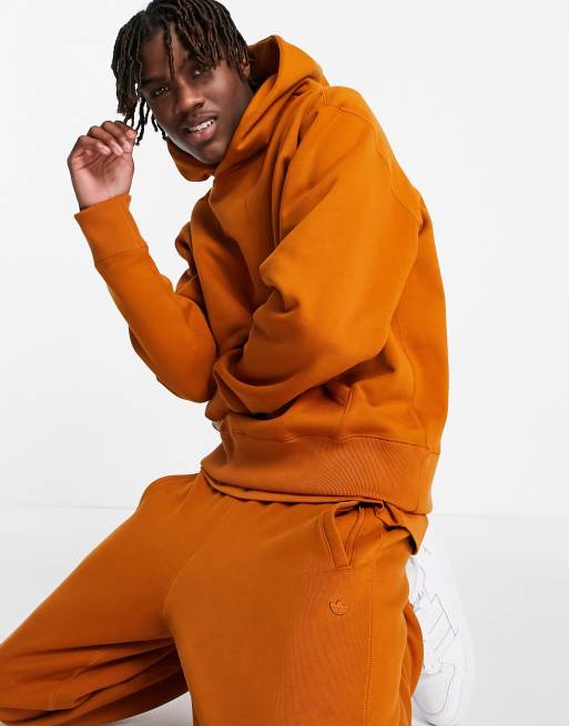 Felpa adidas sale nera e arancione
