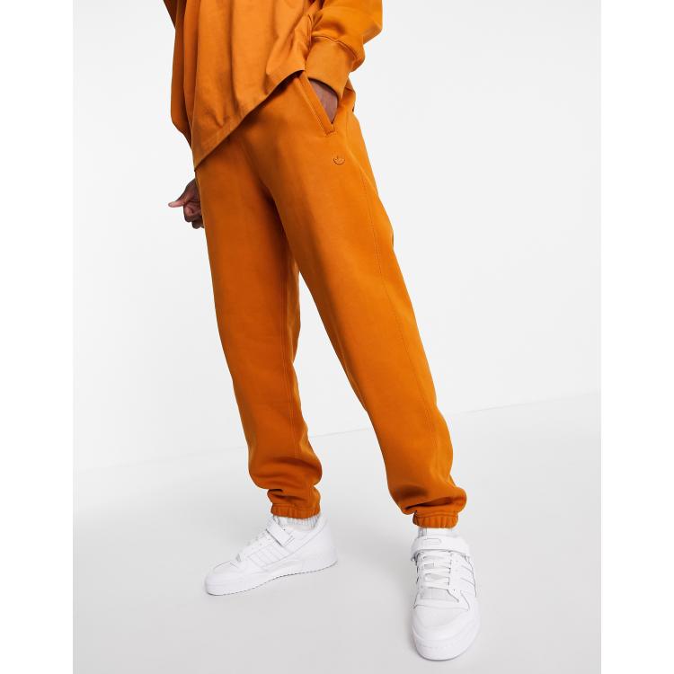 Burnt orange adidas new arrivals tracksuit