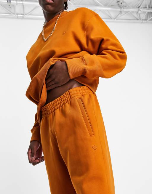 Burnt orange adidas sale