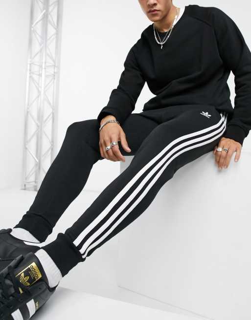 adidas Originals – adicolor – Czarne obcisłe joggersy z trzema paskami