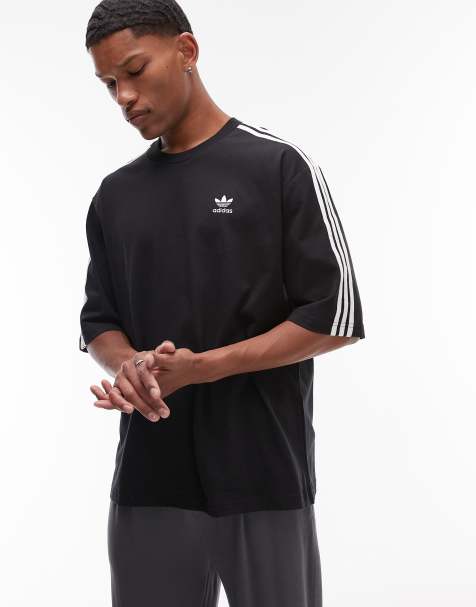 adidas Originals Adicolor 3 stripe oversized t-shirt in black