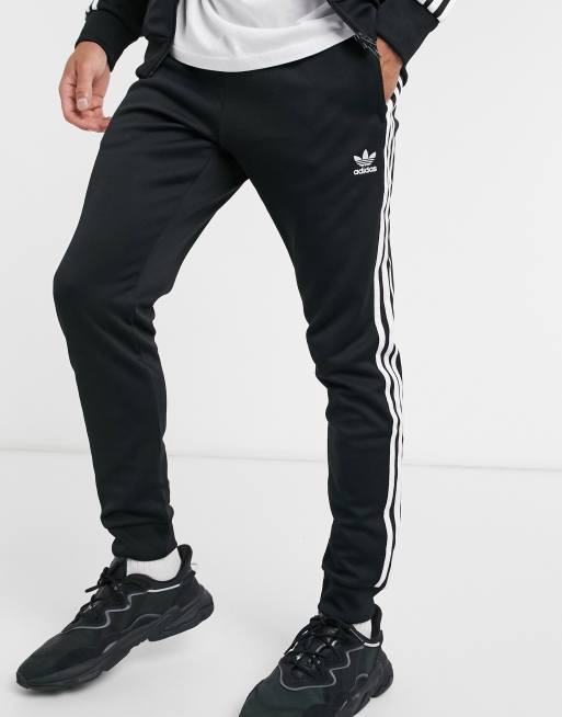 adidas Originals adicolor Eng geschnittene Jogginghose mit den