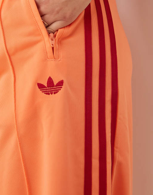adidas Originals Adicolor Firebird oversized track pant in orange