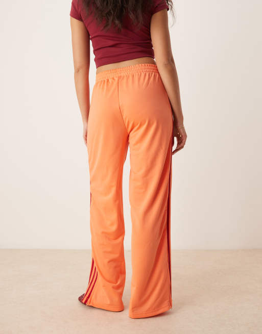 adidas Originals Adicolor Firebird oversized track pant in orange