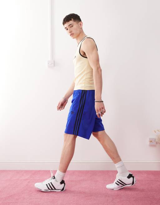 adidas Originals Adicolor firebird shorts in lucid blue / black
