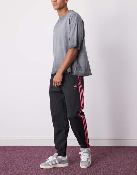 adidas Originals – Adicolor – Firebird – Svart/rosa, vävda träningsbyxor - view 1