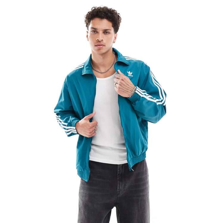 adidas Originals Adicolor Firebird track top in blue ASOS