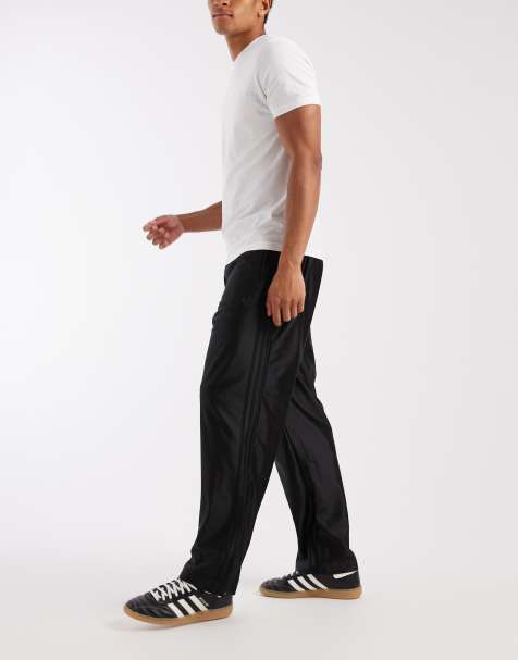 adidas Originals – Adicolor Firebird – Trainingshose in Metallic-Schwarz - view 1